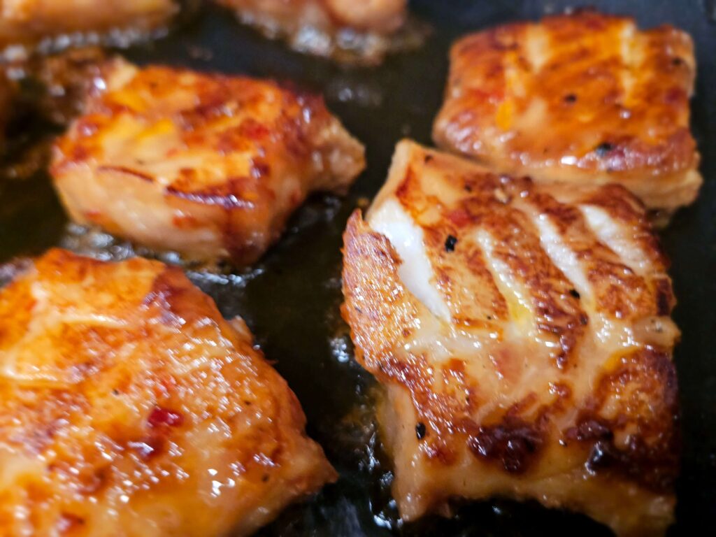 teriyaki cod 12 Teriyaki Cod being seared in a skillet.