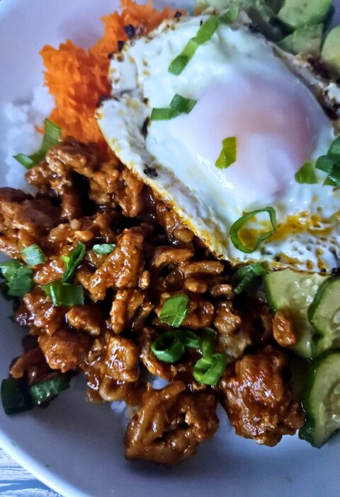 the best gochujang chicken rice bowl with marinated cucumbers