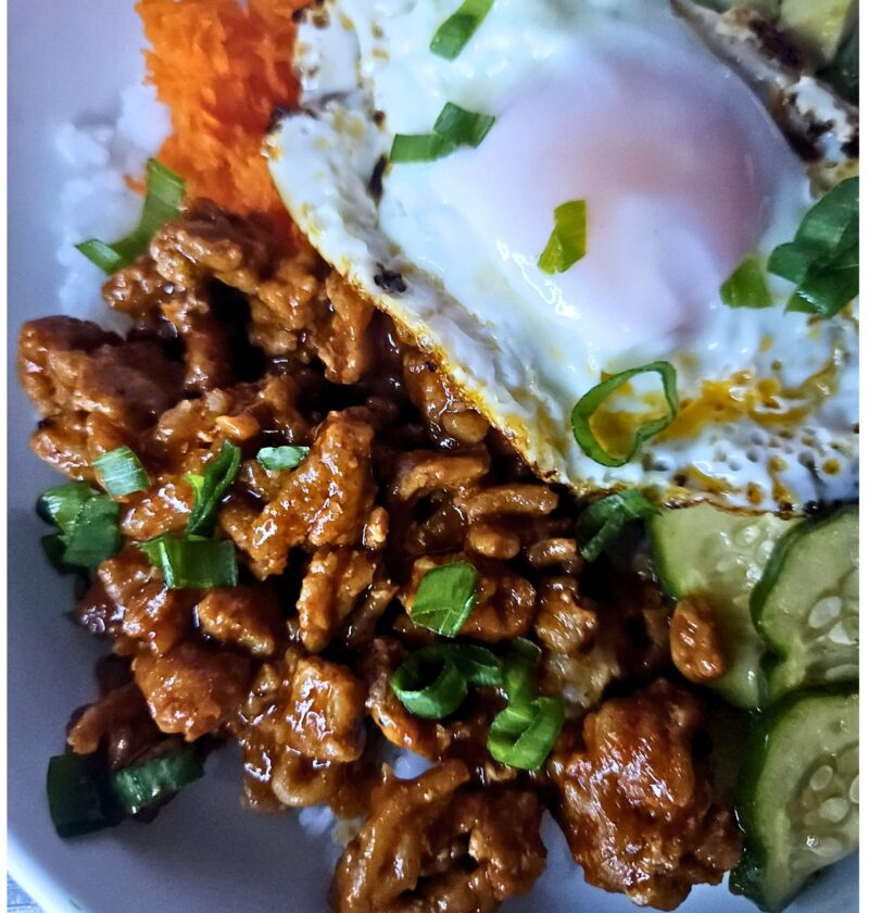 the best gochujang chicken rice bowl with marinated cucumbers