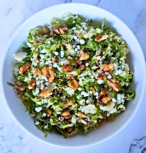 Roasted brussels sprouts salad with maple walnuts and goat cheese.