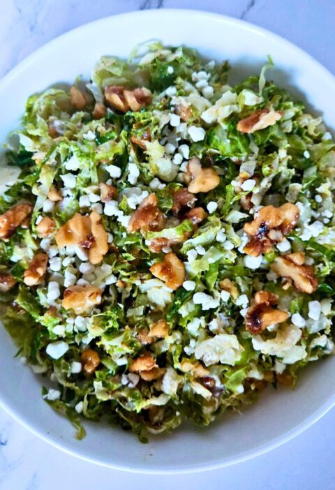 Roasted brussels sprouts salad with maple walnuts and goat cheese.