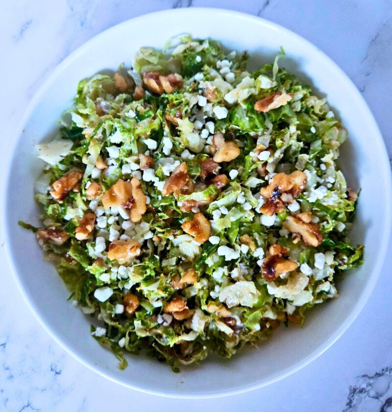 Roasted brussels sprouts salad with maple walnuts and goat cheese.