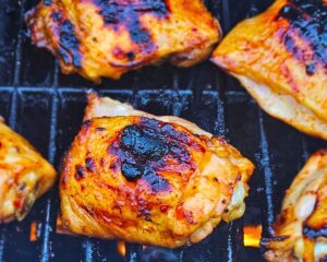 Sweet and Spicy Thai Chicken Thighs on the grill.