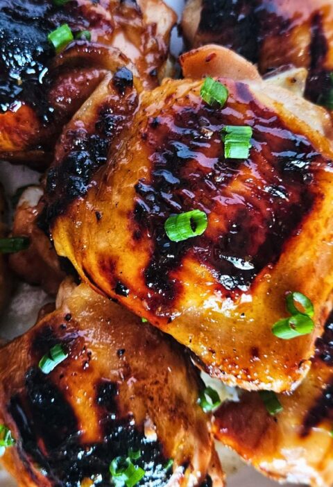 Image of sweet and spicy Thai chicken thighs after being grilled.