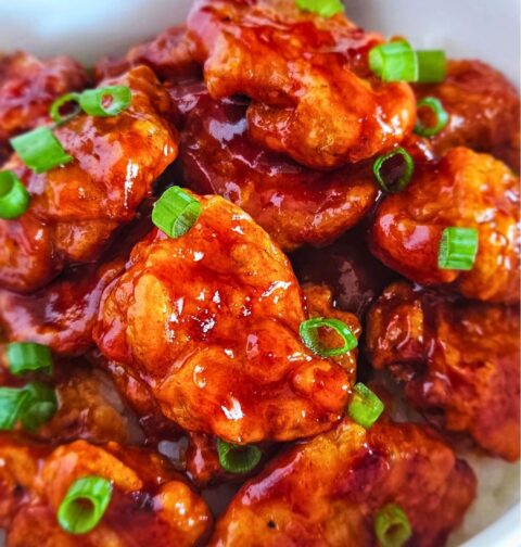 Close up image of air fryer Korean fried chicken in a serving bowl.