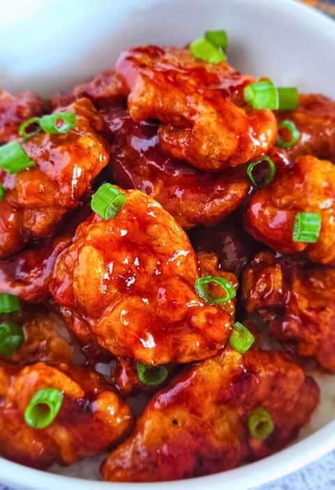 Close up image of air fryer Korean fried chicken in a serving bowl.