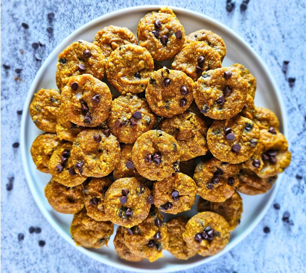 Image of gluten free pumpkin muffins being served on a plate.