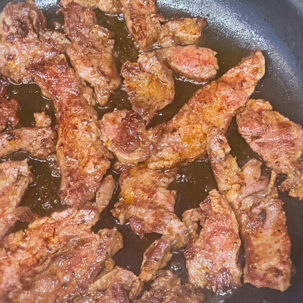 Steak tacos prep 3 Searing the marinated flank steak to make the steak tacos.