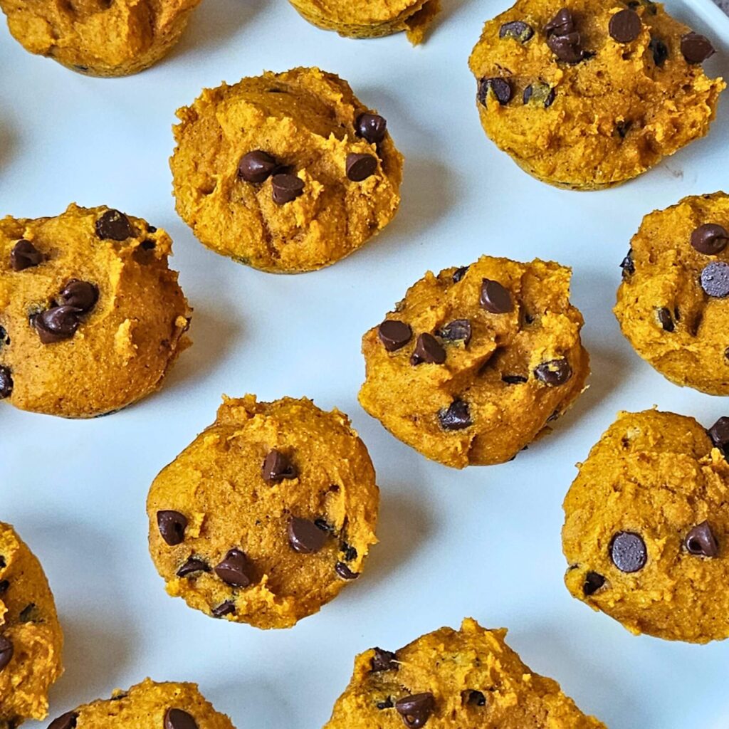 Protein Pumpkin Muffins on a plate after baking.