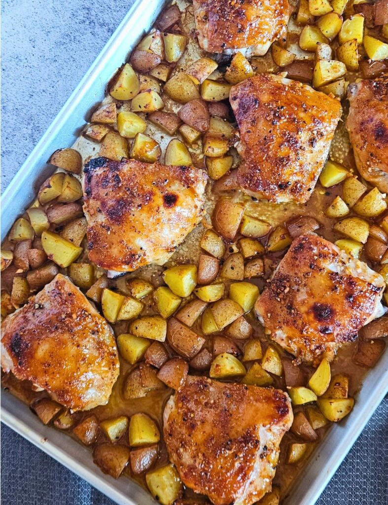 Sheet Pan Honey Mustard Chicken 14 Sheet pan honey mustard chicken thighs with roasted potatoes.