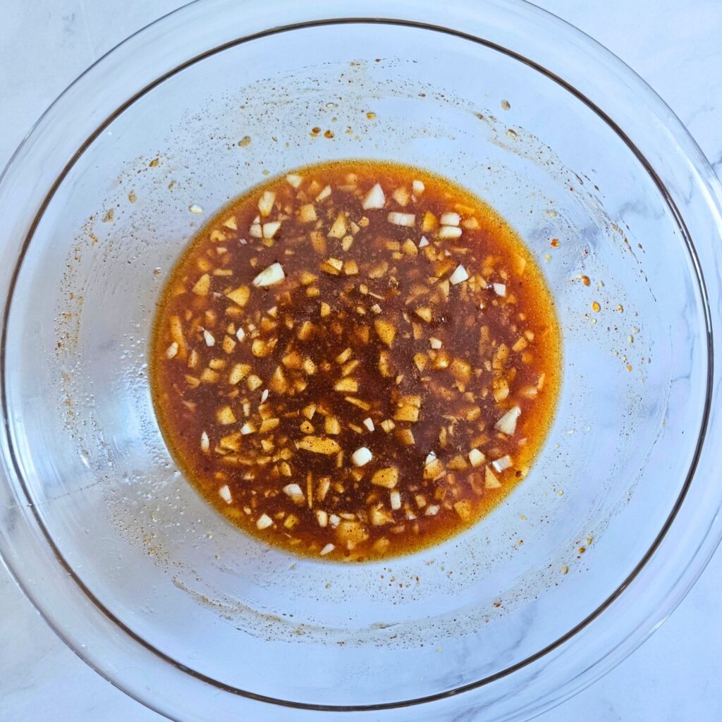 Sheet Pan Honey Mustard Chicken Prep 5 Prepared honey mustard sauce for sheet pan chicken thighs and potatoes