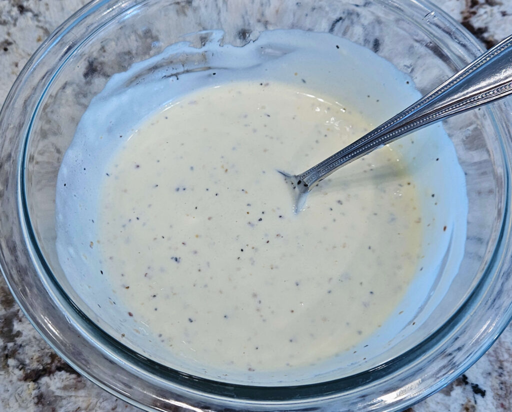 Image of creamy easy garlic aioli after combining ingredients.