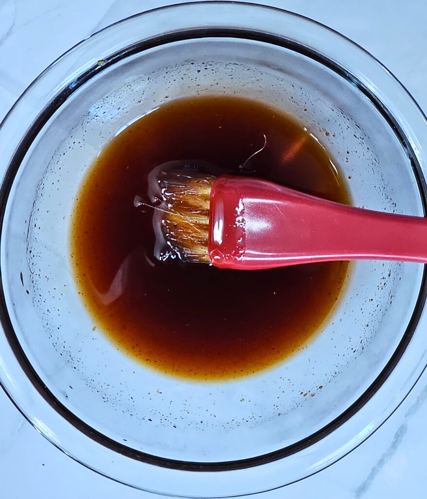 Sticky glaze for smashed dumpling tacos.