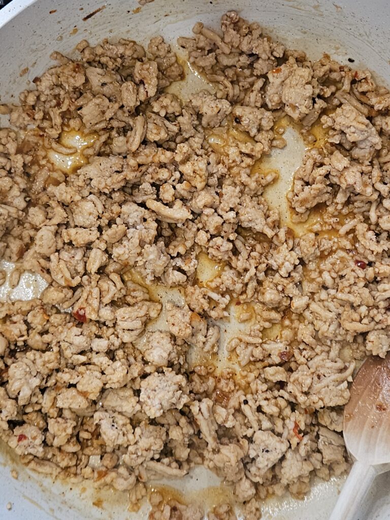 Ramen Prep 1 Image of ground chicken cooking for the ramen bowl.